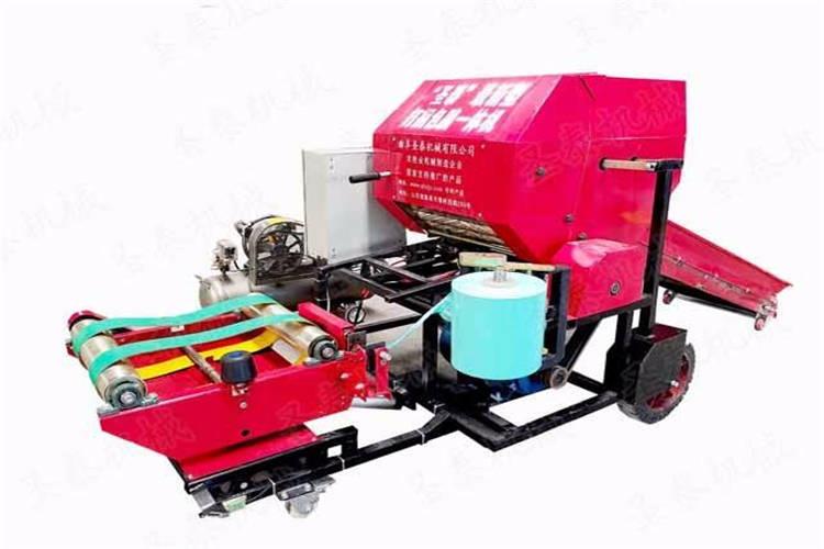 圓形打捆包膜機是青（qīng）貯、微貯（zhù）包膜用設備。使用本機器可將捆紮好的鮮秸稈類和鮮草類圓草捆進（jìn）行自動包膜